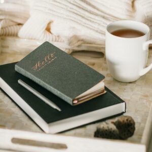 Photo Of Cup Beside Books