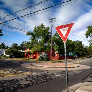red street signage on focus photography